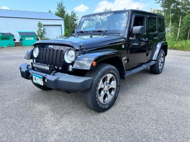 Used 2018 Jeep Wrangler JK Unlimited Sahara with VIN 1C4BJWEG1JL937034 for sale in Hibbing, Minnesota